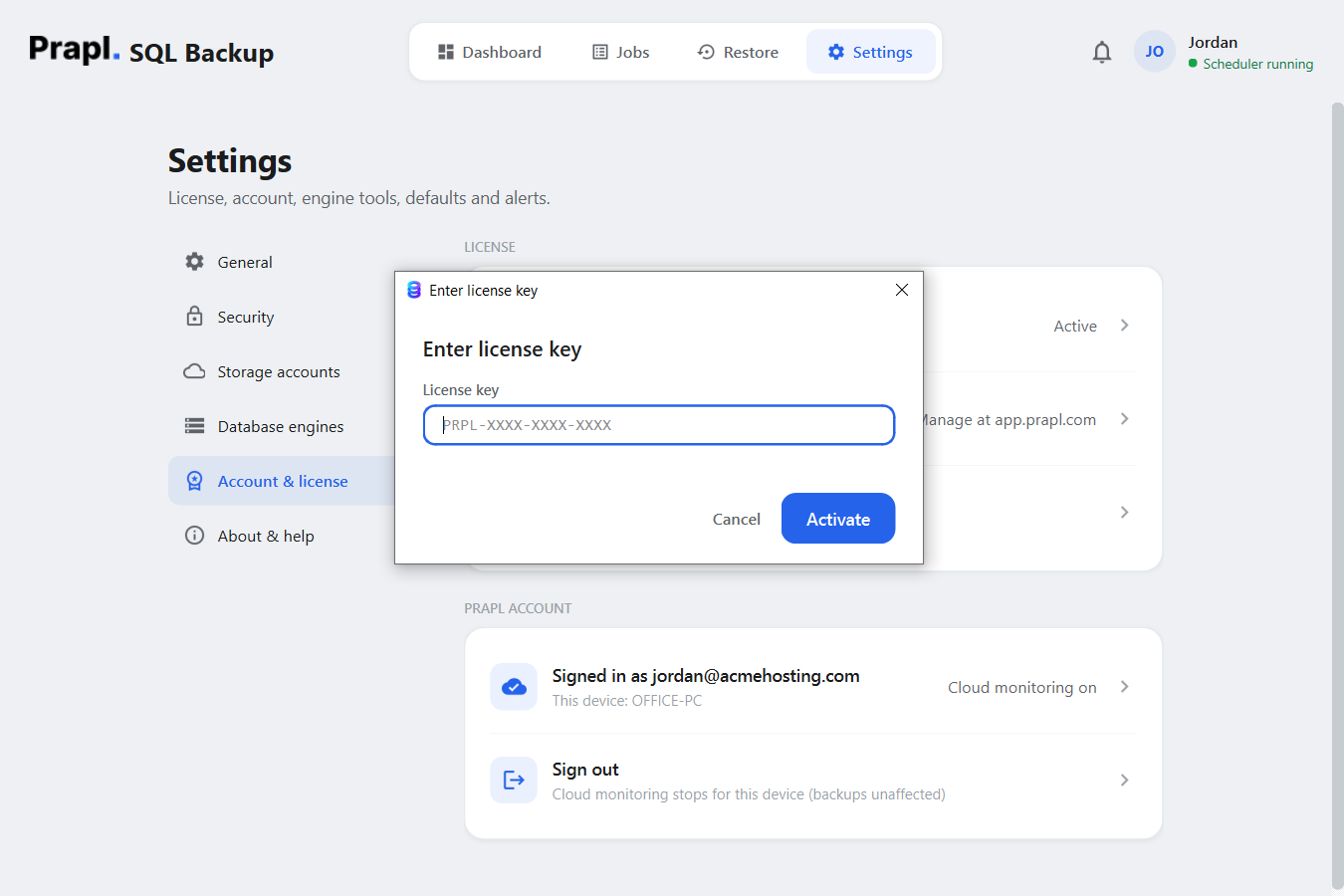 The Enter license key dialog over the Settings › Account and license page, with a License key field and an Activate button